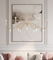 Toussant 6 Light 63" Chandelier in Modern Gold in a room setting