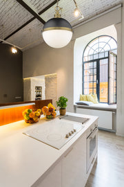 Peyton 2 Light 14.75" Pendant in Matte Black + Factory Bronze in a room setting