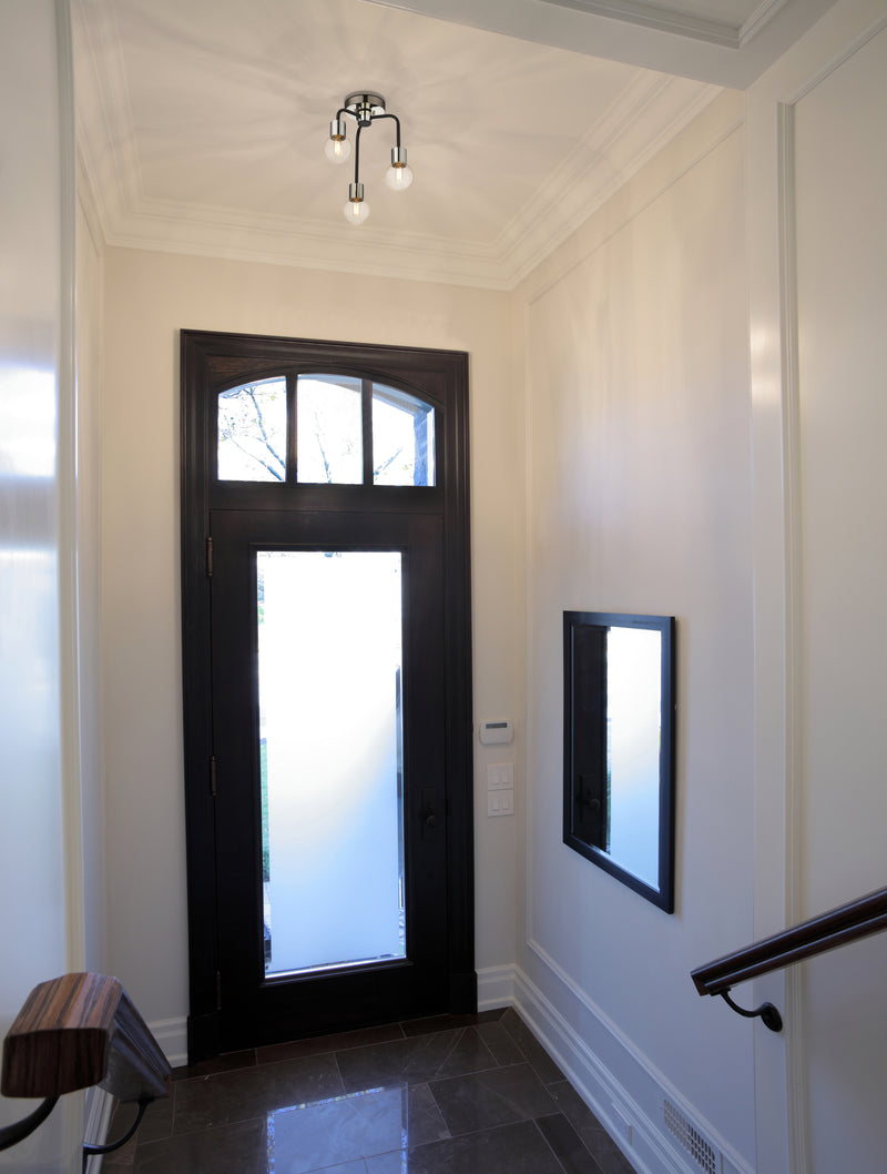 Neutra 3 Light 14" Semi Flush Mount in Matte Black + Polished Nickel in a room setting