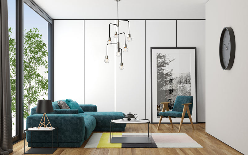 Neutra 7 Light 22.5" Chandelier in Matte Black + Polished Nickel in a room setting