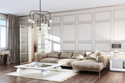 Neutra 9 Light 26.5" Chandelier in Matte Black + Polished Nickel in a room setting