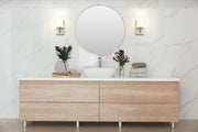 Cadoc 1 Light 4.5" Wall Sconce in Brushed Nickel in a room setting