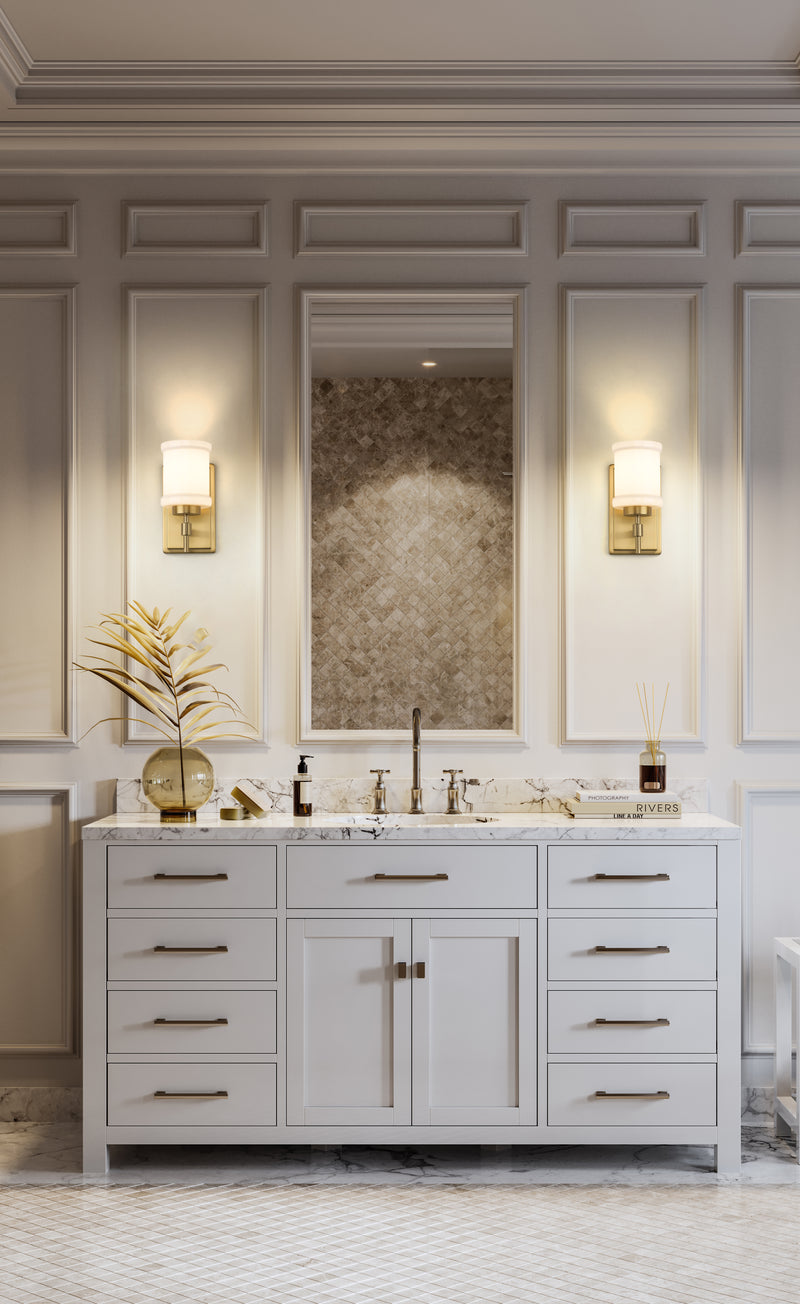 Cadoc 1 Light 4.5" Wall Sconce in Modern Gold in a room setting