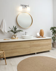 Cadoc 2 Light 15" Vanity in Chrome in a room setting