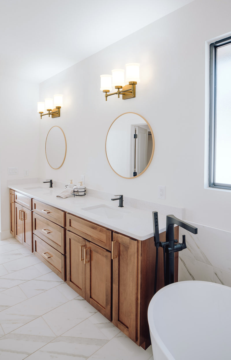 Cadoc 3 Light 23.5" Vanity in Modern Gold in a room setting