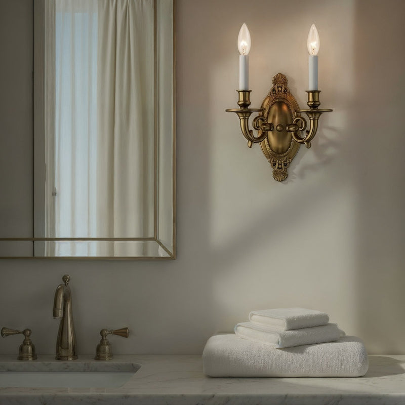 Milford 2 Light 9.5" Sconce in Aged Brass in a room setting