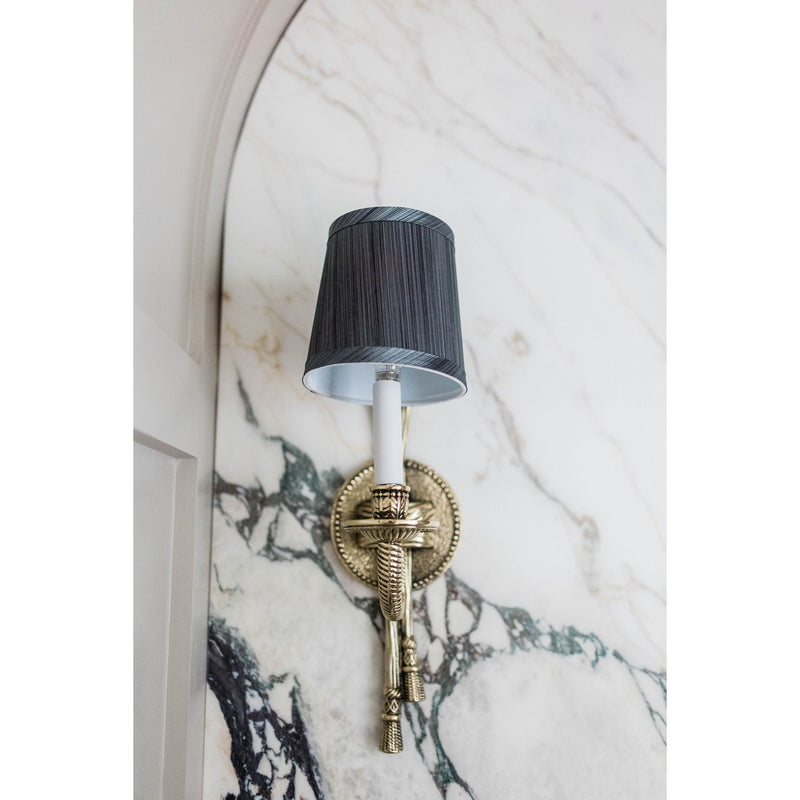 Lexsi 1 Light 4.5" Sconce in Olde Brass in a room setting