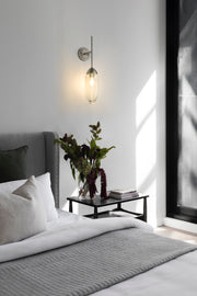 Arden 1 Light 4.5" Wall Sconce in Brushed Nickel in a room setting