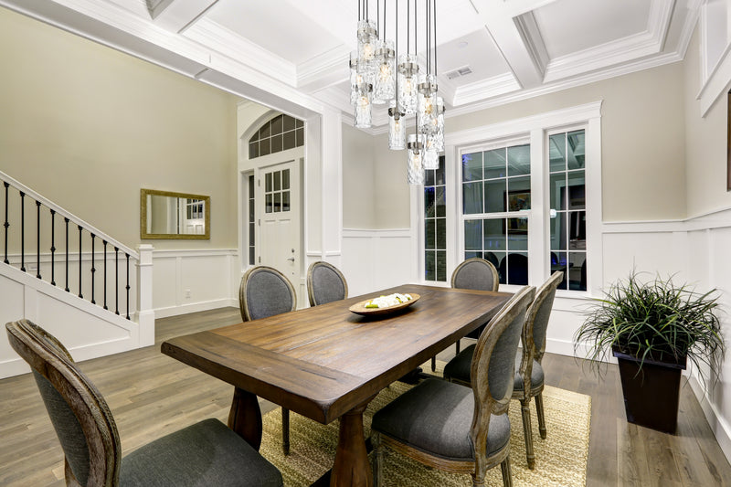 Fontaine 11 Light 26.25" Pendant in Brushed Nickel in a room setting