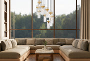Fontaine 11 Light 26.25" Pendant in Rubbed Brass in a room setting