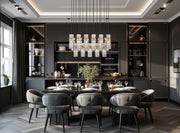 Fontaine 17 Light 44.25" Linear Pendant in Rubbed Brass in a room setting