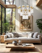 Fontaine 27 Light 39.5" Pendant in Rubbed Brass in a room setting