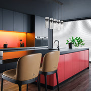 Fontaine 5 Light 44.25" Linear Pendant in Matte Black in a room setting