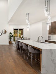 Fontaine 5 Light 14.5" Pendant in Brushed Nickel in a room setting
