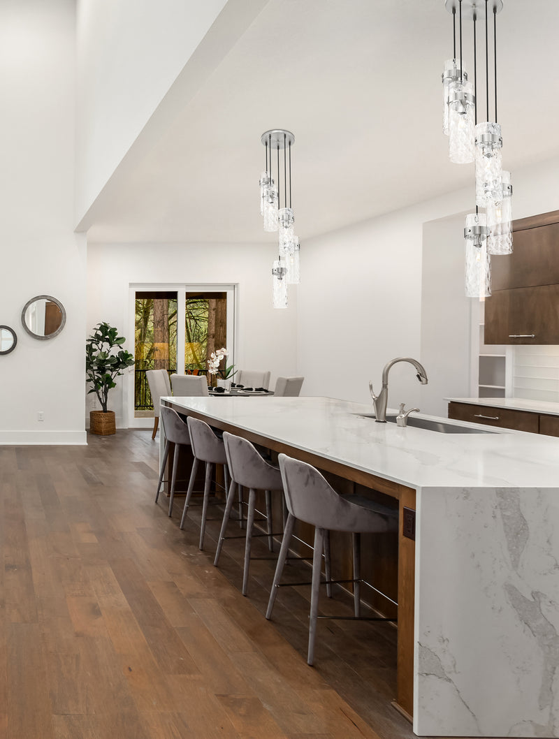 Fontaine 5 Light 14.5" Pendant in Brushed Nickel in a room setting