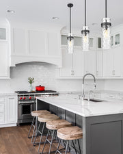 Fontaine 1 Light 5.75" Pendant, Rod Mount in Matte Black in a room setting