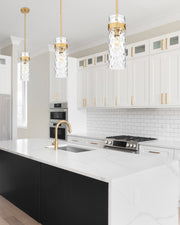Fontaine 1 Light 5.75" Pendant, Rod Mount in Rubbed Brass in a room setting