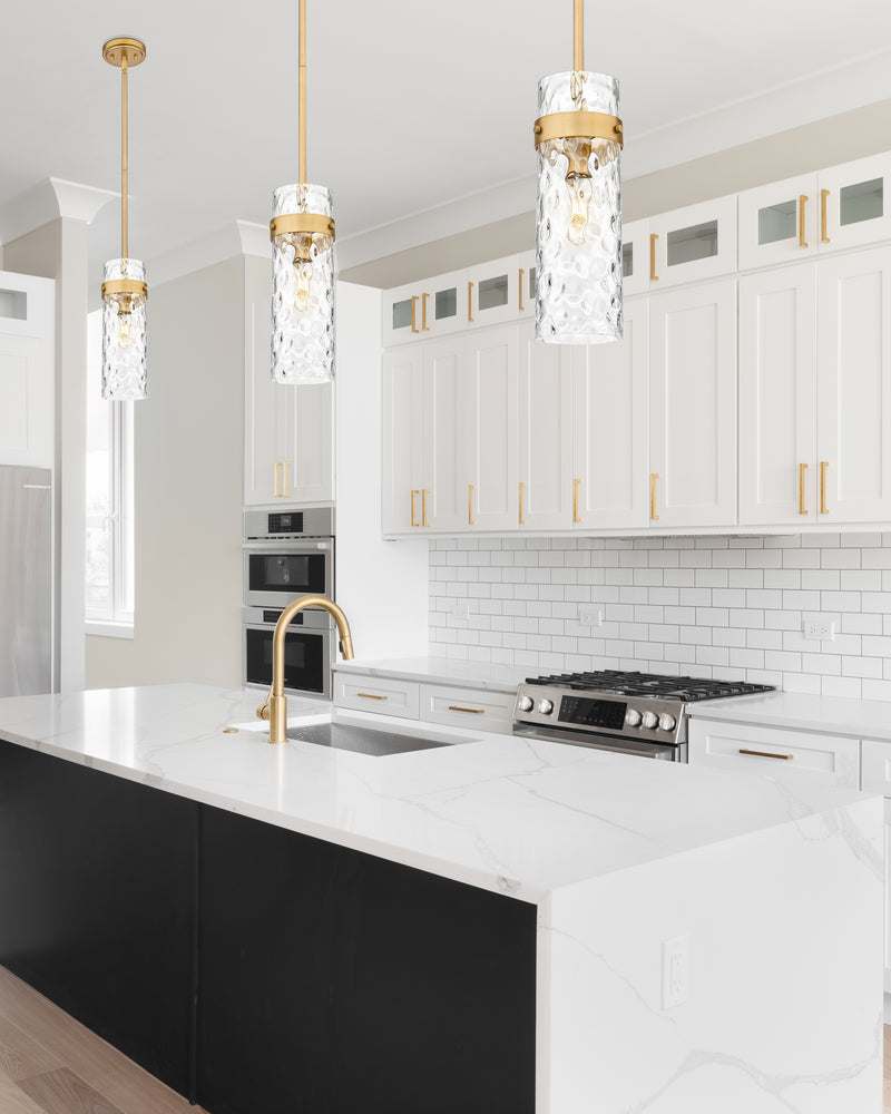 Fontaine 1 Light 5.75" Pendant, Rod Mount in Rubbed Brass in a room setting