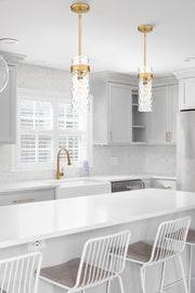 Fontaine 1 Light 5.75" Pendant, Rod Mount in Rubbed Brass in a room setting