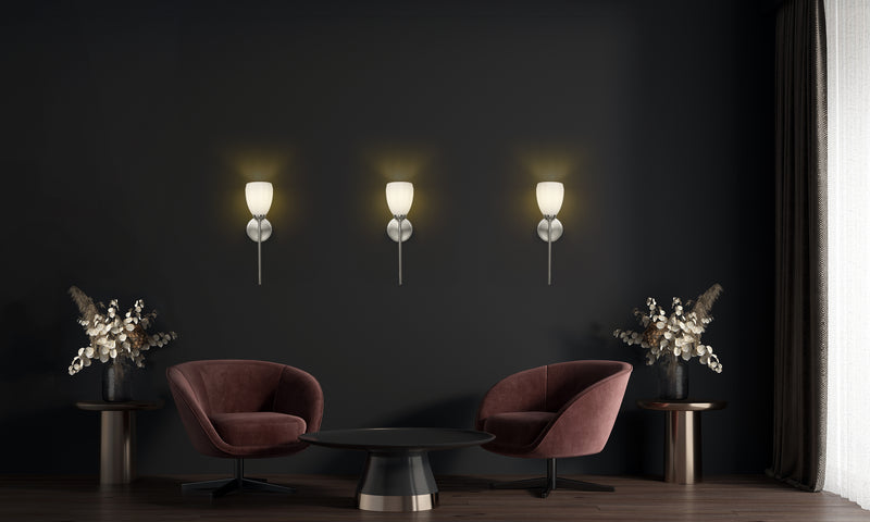 Oren 1 Light 5.25" Wall Sconce in Brushed Nickel in a room setting