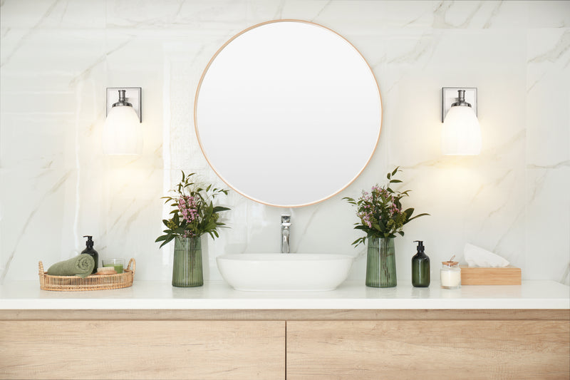 Oren 1 Light 6.5" Vanity in Brushed Nickel in a room setting