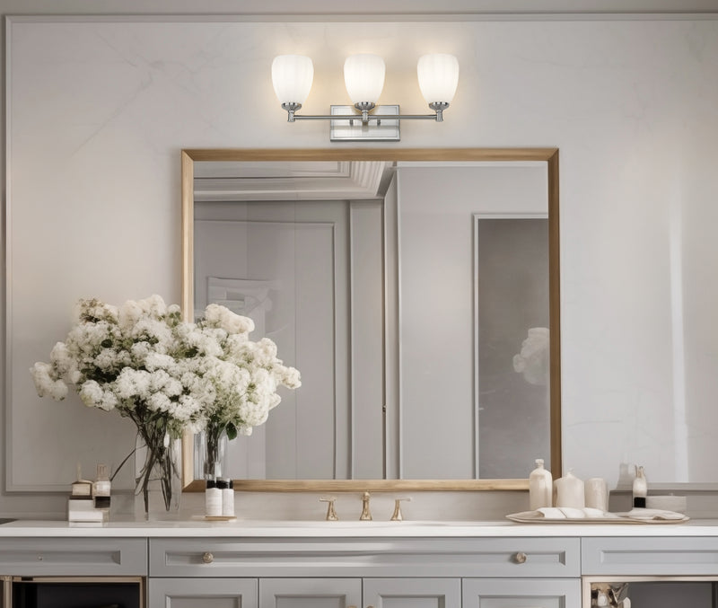Oren 3 Light 24" Vanity in Brushed Nickel in a room setting