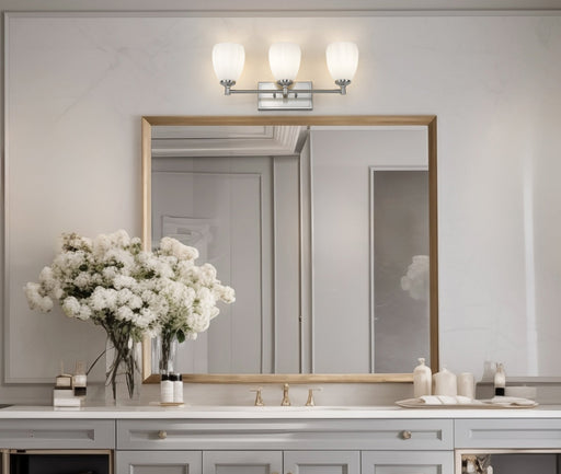 Oren 3 Light 24" Vanity in Brushed Nickel in a room setting