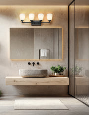 Oren 4 Light 31" Vanity in Matte Black in a room setting