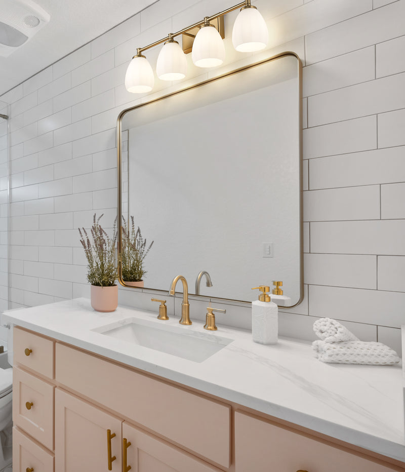 Oren 4 Light 31" Vanity in Modern Gold in a room setting