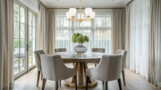 Oren 5 Light 25" Chandelier in Modern Gold in a room setting