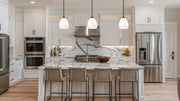 Oren 1 Light 8" Pendant in Matte Black in a room setting