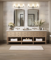 Montford 3 Light 24" Vanity in Brushed Nickel in a room setting
