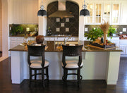 Melange 1 Light 8.25" Pendant in Matte Black + Chrome in a room setting