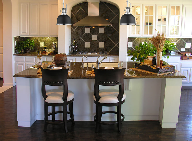 Melange 1 Light 8.25" Pendant in Matte Black + Chrome in a room setting