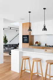 Melange 1 Light 8.25" Pendant in Matte Black in a room setting
