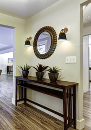 Z-Studio 1 Light 8" Wall Sconce, Metal Shades in Matte Black + Heritage Brass in a room setting