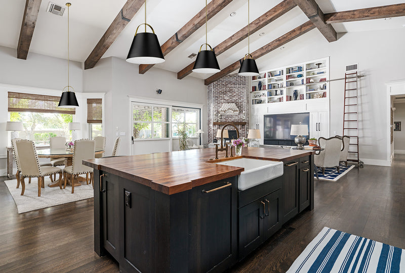 Z-Studio 1 Light 18" Pendant, Metal Shades in Matte Black + Heritage Brass in a room setting