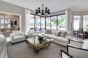 Soriano 5 Light 27" Chandelier in Matte Black + Brushed Nickel in a room setting