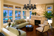 Soriano 9 Light 32" Chandelier in Matte Black + Brushed Nickel in a room setting