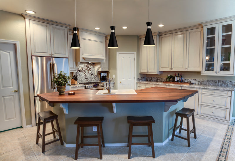Soriano 1 Light 8" Pendant in Matte Black + Brushed Nickel in a room setting