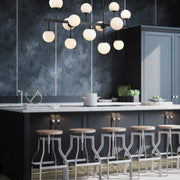 Midnetic 13 Light 45.5" Linear Pendant in Matte Black in a room setting
