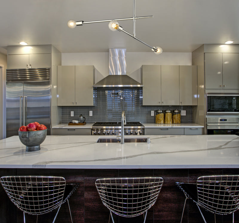 Modernist 3 Light 4.75" Chandelier, Chrome in Chrome in a room setting