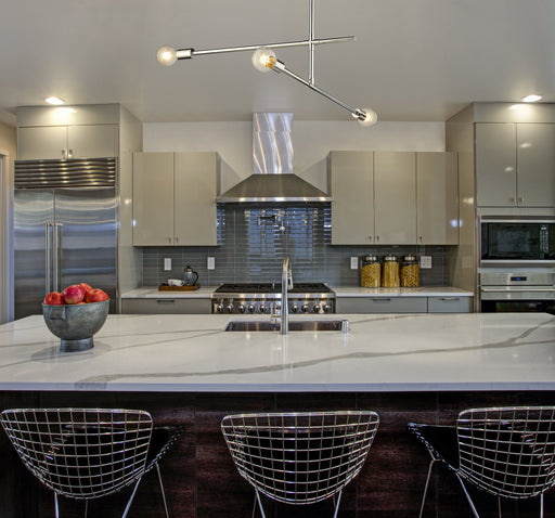 Modernist 3 Light 4.75" Chandelier, Chrome in Chrome in a room setting