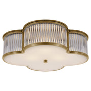 Basil Three Light Flush Mount in Natural Brass with Clear Glass