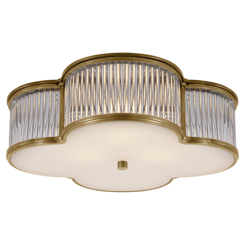 Basil Three Light Flush Mount in Natural Brass with Clear Glass