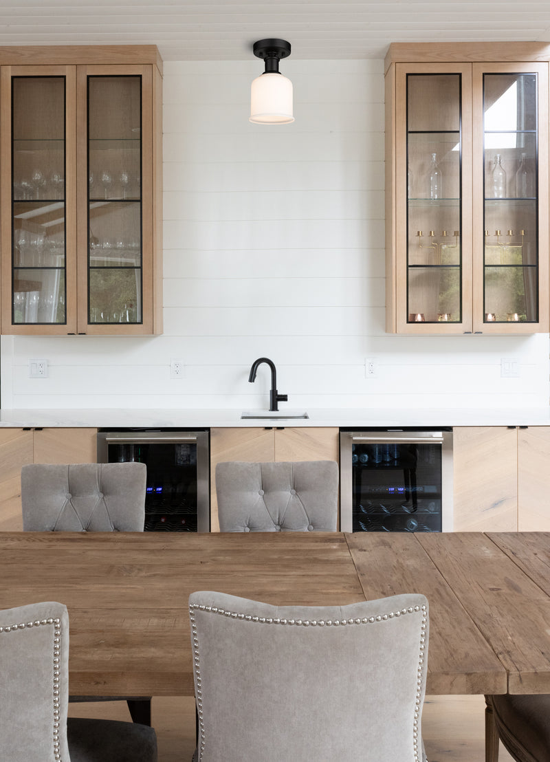 Bryant 1 Light 5.5" Flush Mount in Matte Black in a room setting