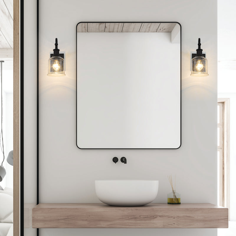 Bryant 1 Light 5.5" Wall Sconce in Matte Black in a room setting