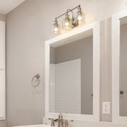 Bryant 3 Light 24" Vanity in Brushed Nickel in a room setting