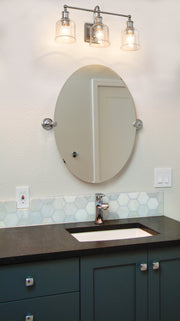 Bryant 3 Light 24" Vanity in Brushed Nickel in a room setting