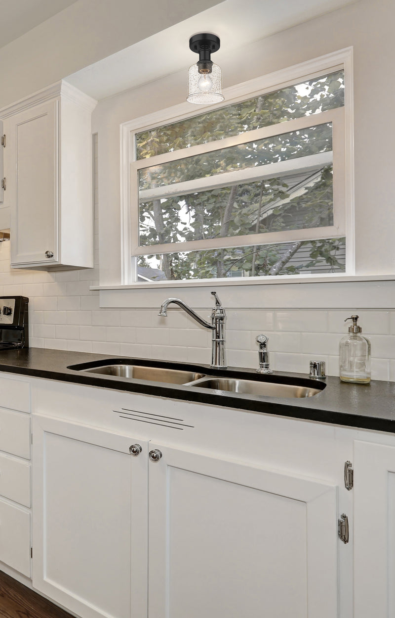 Bryant 1 Light 5.5" Flush Mount in Matte Black in a room setting